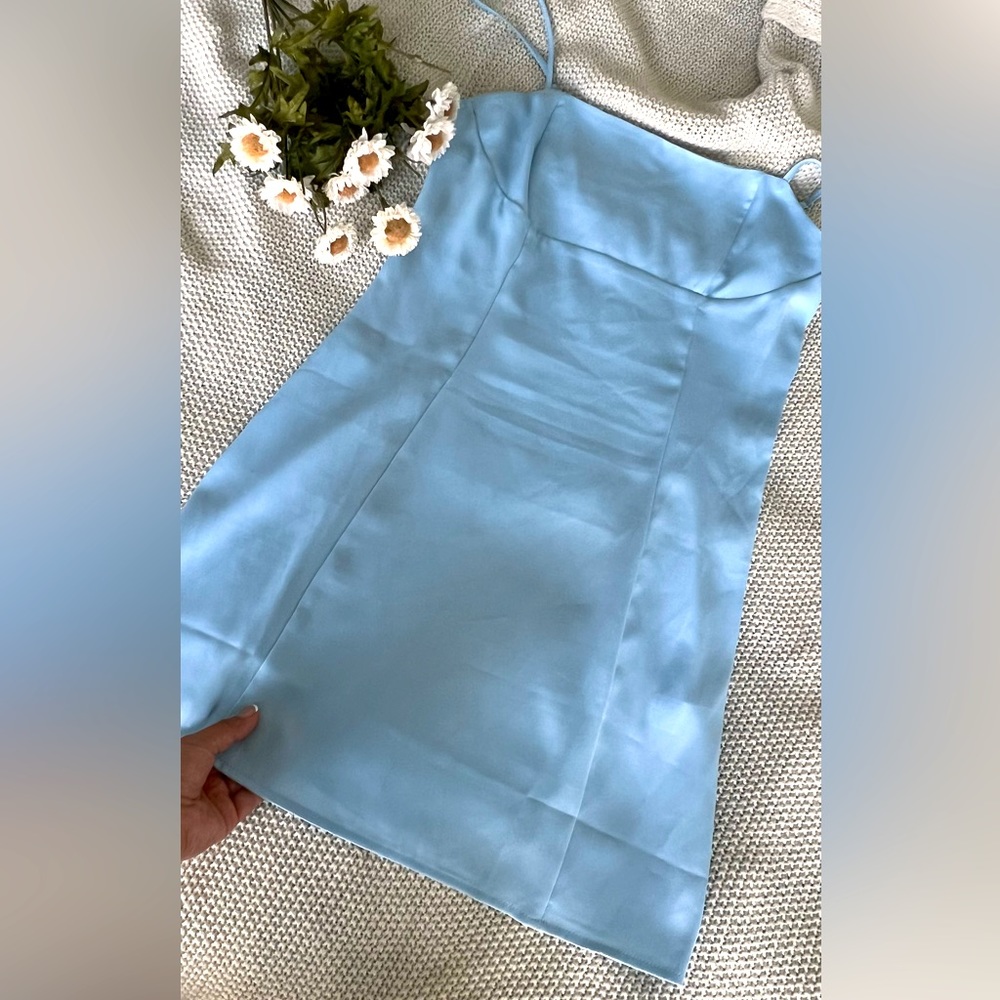 Very soft blue dress in silk size s very cute, it has only been worn once.